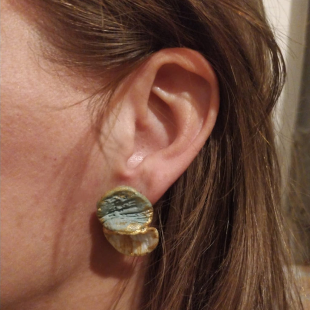 Venus - conjunto con pétalos turquesa y blancos